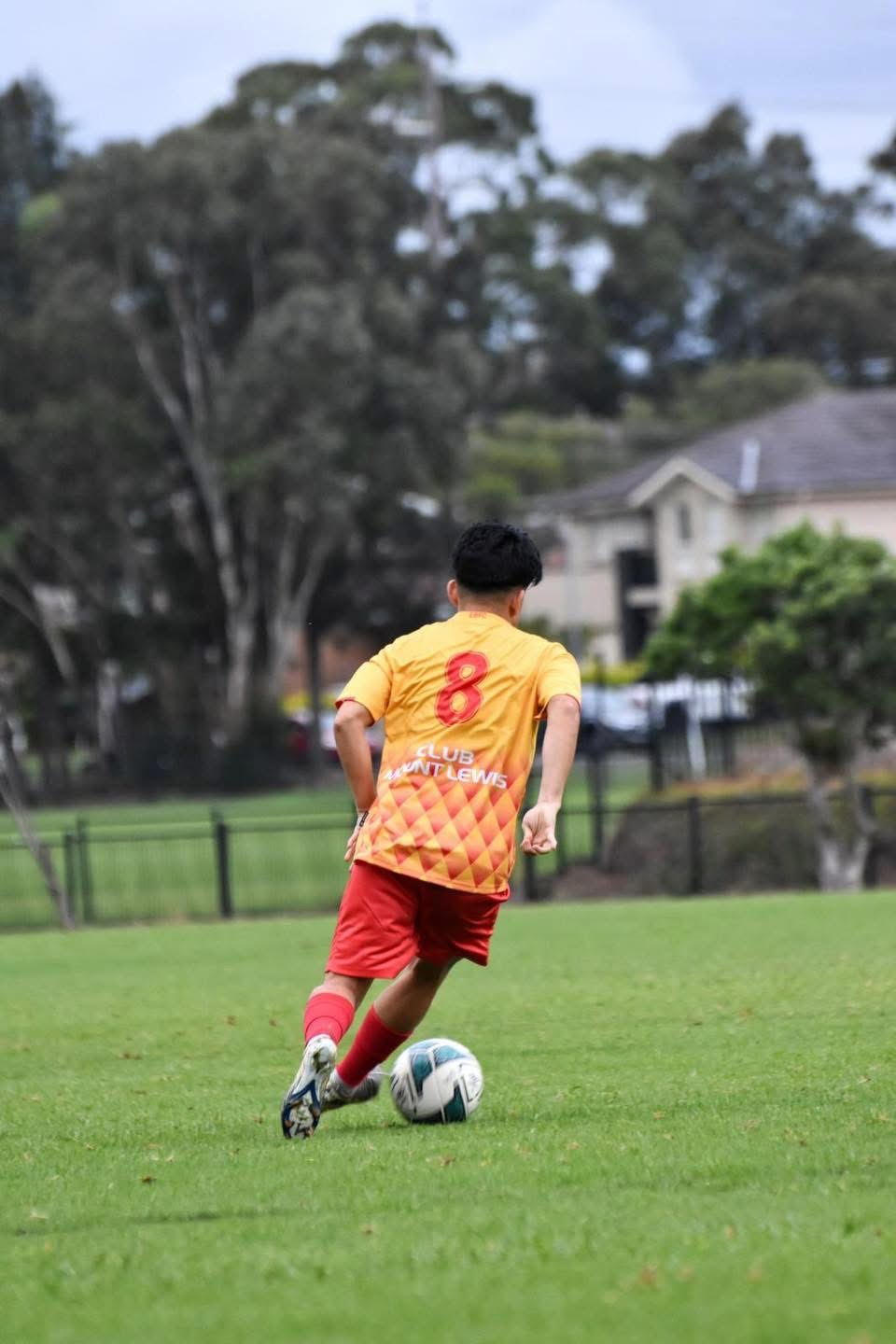 Mohammad Karimi playing football